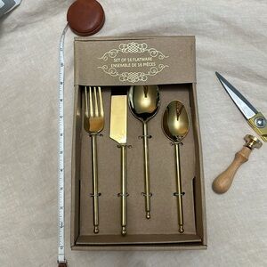 Set of 16 flatware pieces gold color brand new